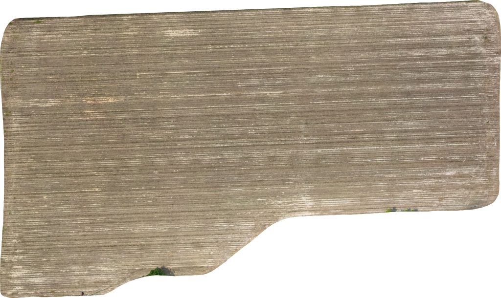 Image taken of the Front Field from a drone on 6/2/25. The field is a uniform tan color, indicating plant residue in the field.